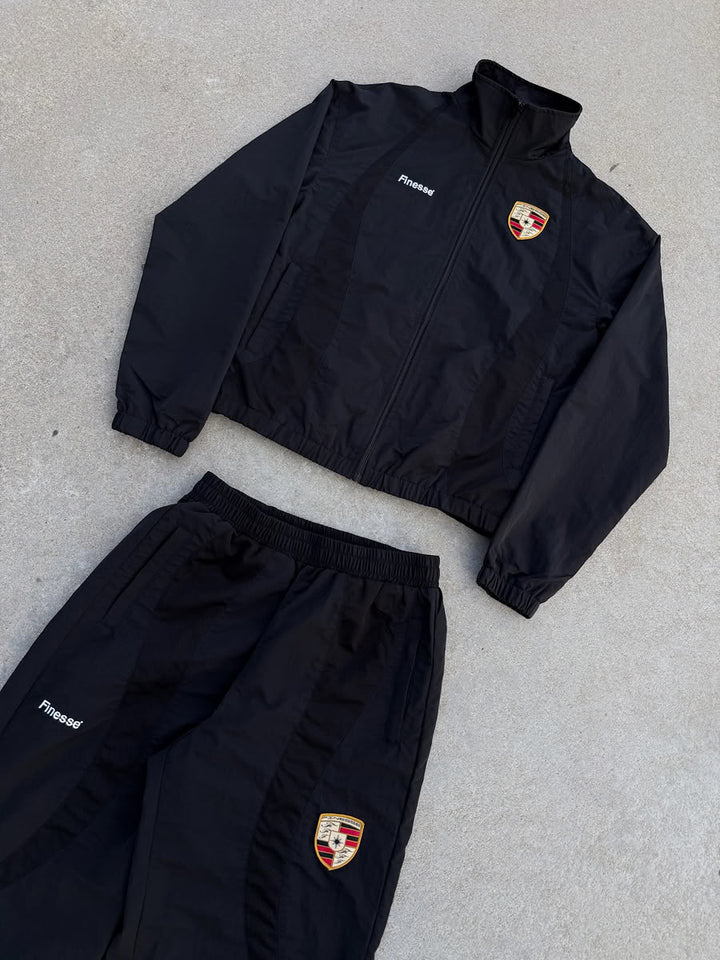 911 Zip Jacket Black - flat lay - Finesse