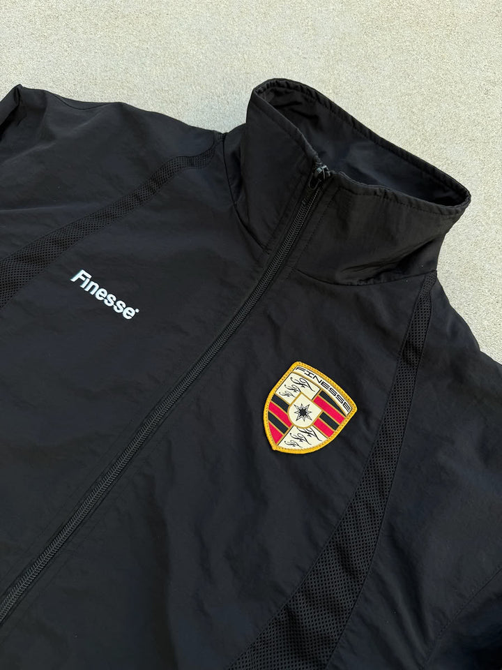 911 Zip Jacket Black - flat lay detail - Finesse