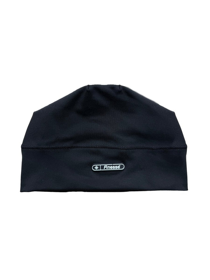 Bonnet Finesse Skull Cap Beanie posé sur fond blanc.
