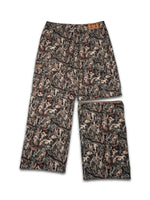 Pantalon cargo camouflage avec jambes détachables, modulable en short, design militaire moderne et fonctionnel.
