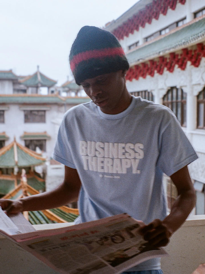 Model wearing the Business Therapy Tee Baby Blue - Finesse lookbook