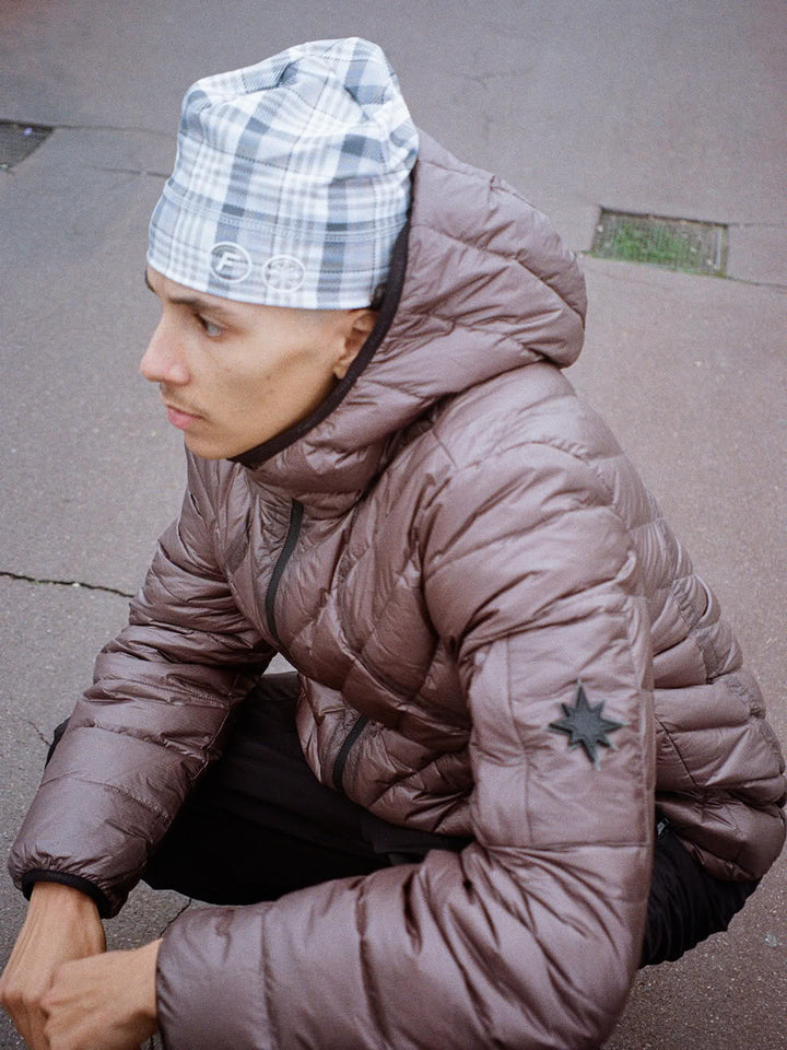 Model wearing the Slim Puffer Jacket Dark Grey - Finesse lookbook