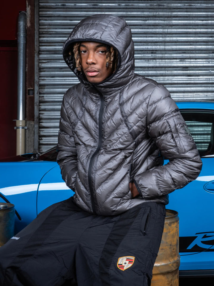 Model wearing the Slim Puffer Jacket Dark Grey - Finesse lookbook