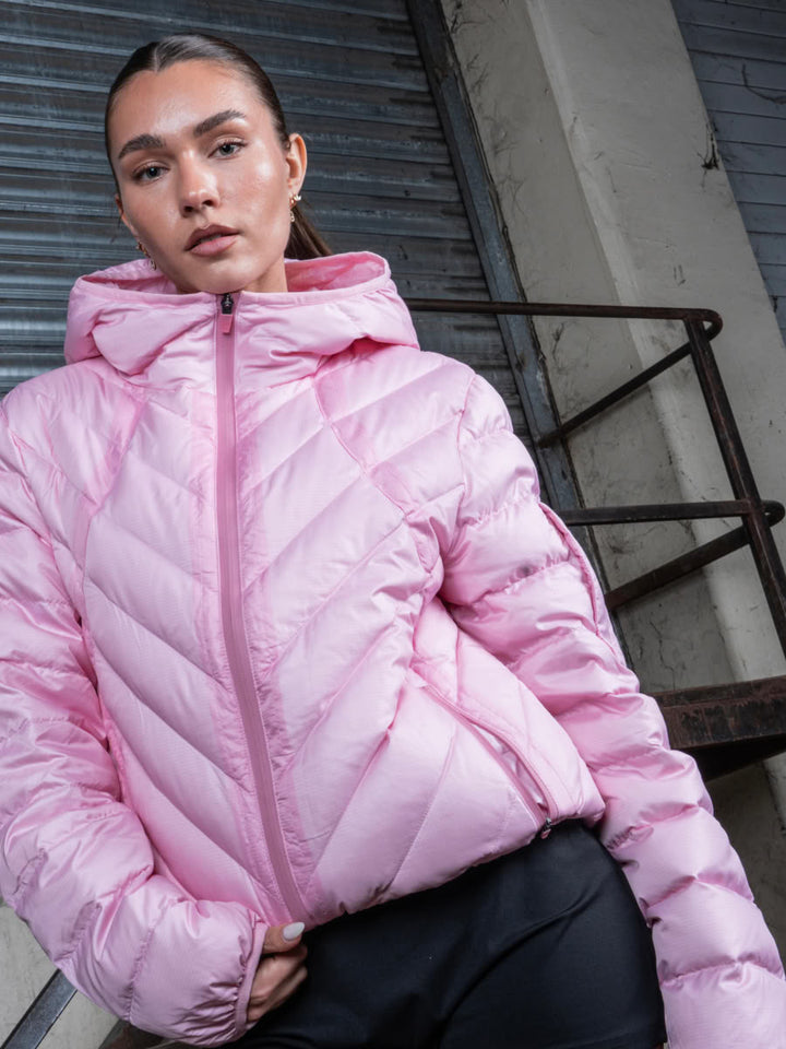 Model wearing the Slim Puffer Jacket Pink - Finesse lookbook